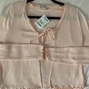 Light pink sweater size medium